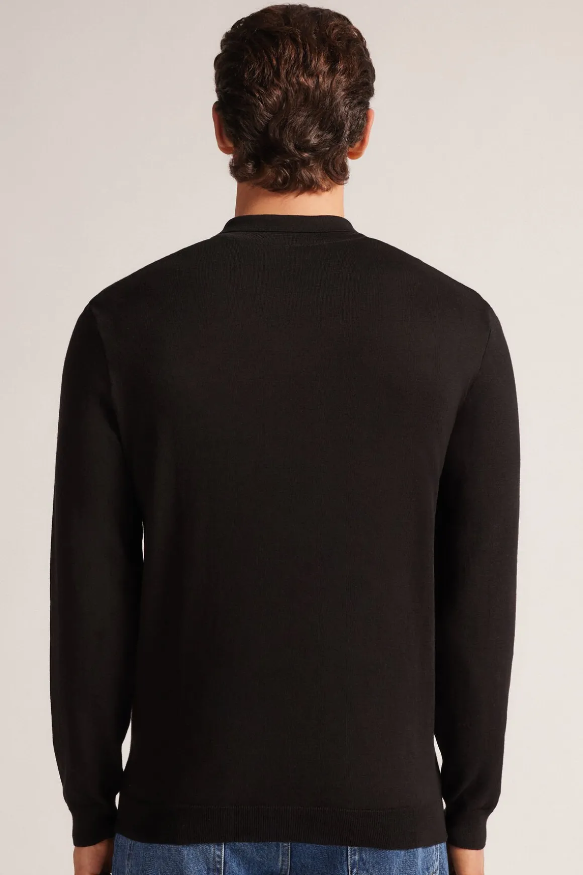 Polo manches longues en maille avec zip