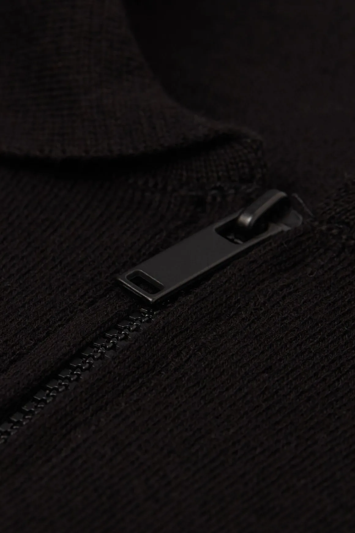 Polo manches longues en maille avec zip
