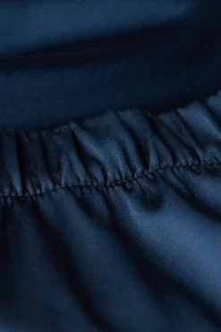 Short en soie avec bordure